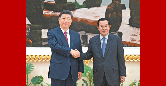 习近平会见柬埔寨人民党主席、参议院主席洪森
