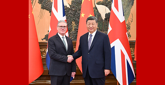 习近平会见英国首相斯塔默