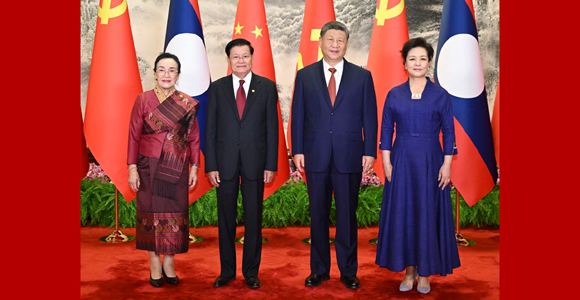 习近平同老挝人民革命党中央总书记、国家主席通伦举行会谈