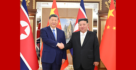 习近平同金正恩举行会谈