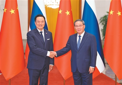  李强同泰国总理阿努廷会谈 